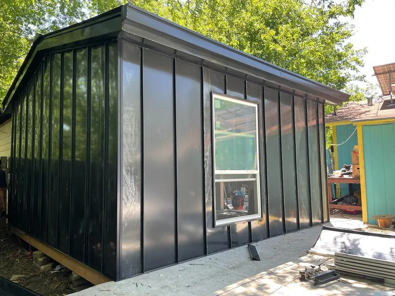 Black standing seam metal wall panels for Roof Inspection in Fountain