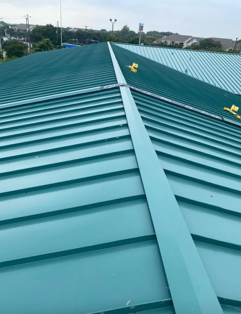 Green commercial metal roof ridge and valley for Metal Roof Repair in Fountain
